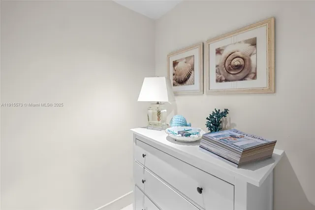 a bed sitting in a bedroom next to a yard