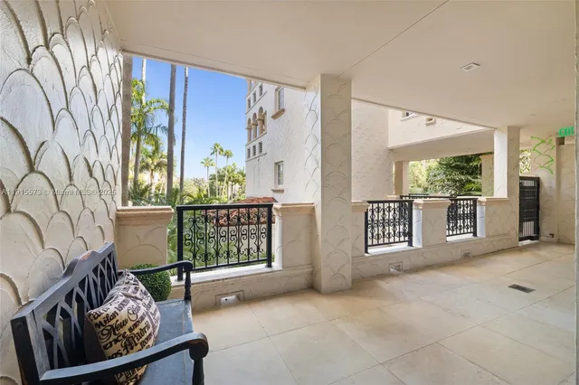 a view of a lake with couches and city view