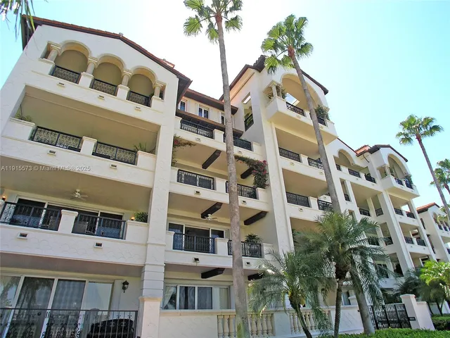 a view of a swimming pool with lounge chairs