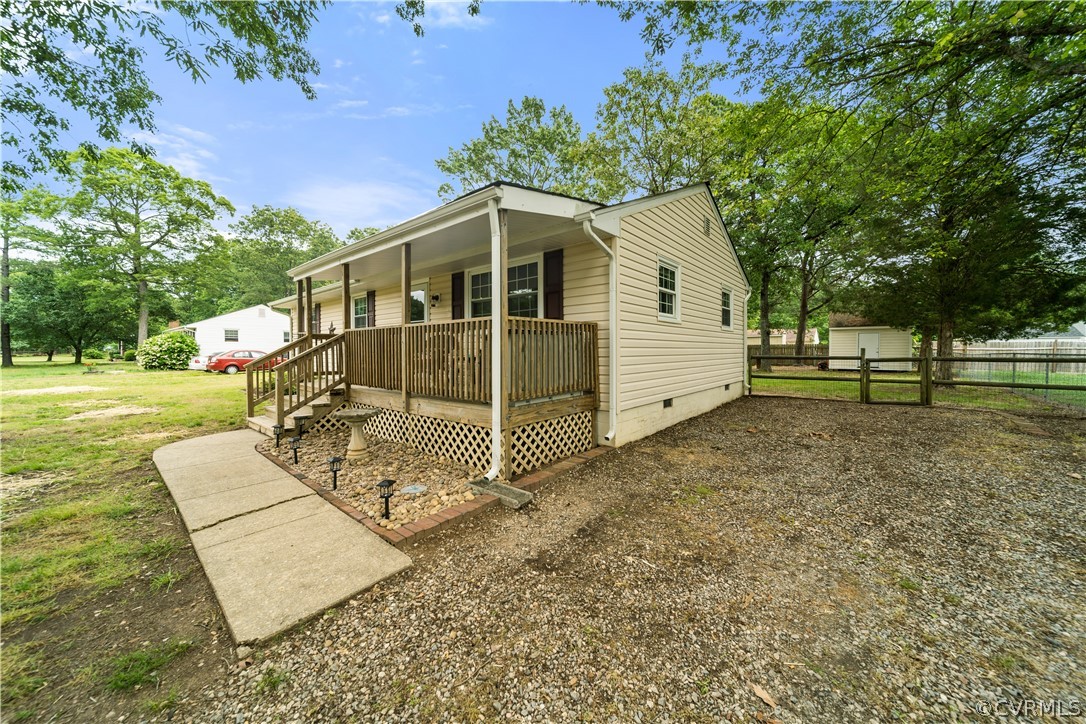 15601 Saddlebrook Road Chesterfield, VA 23838 - Photo 3 of 34 a front view of a house with garden