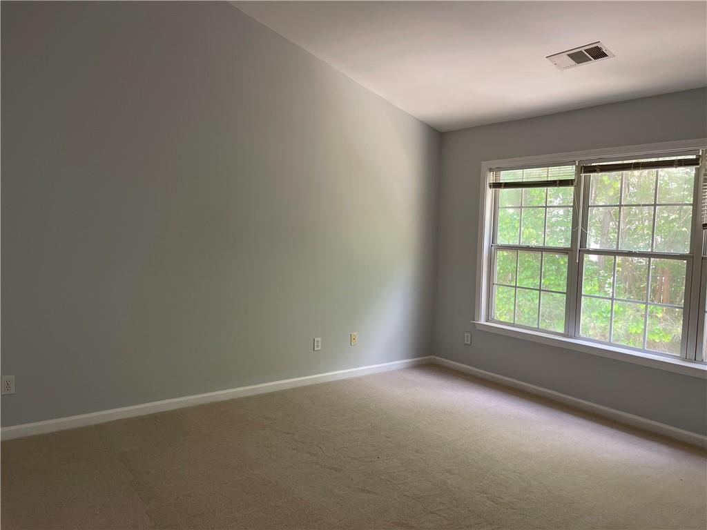 3118 Stanstead Court Norcross, GA 30071 - Photo 11 of 14 an empty room with a window