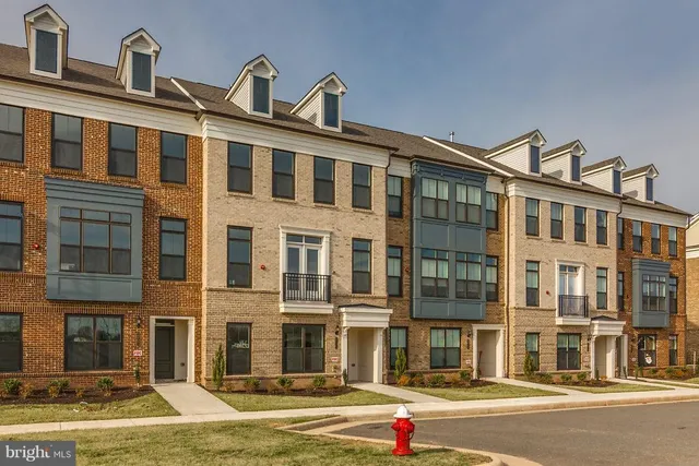 a front view of a building with street view