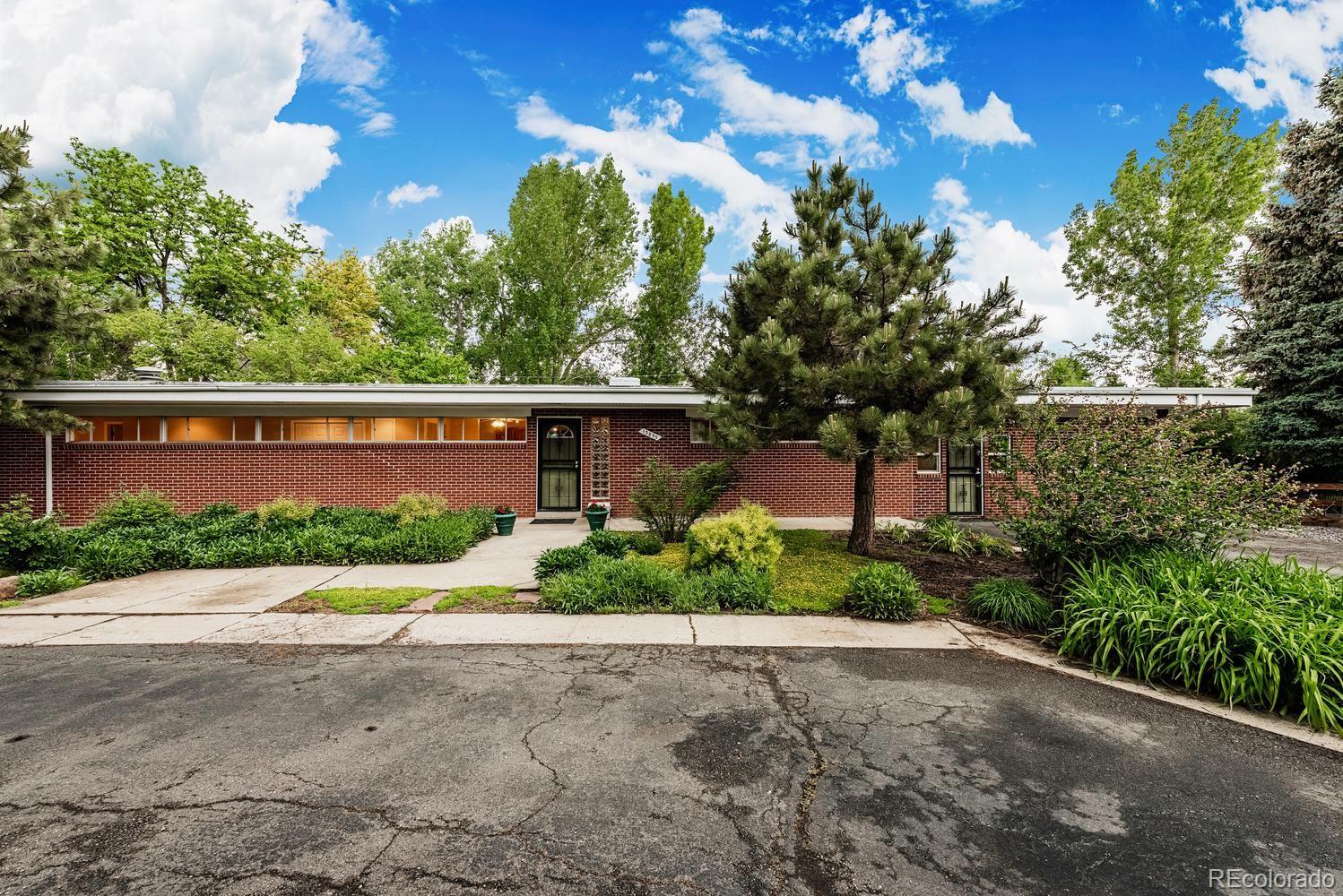 13895 Braun Road Golden, CO 80401 - Photo 1 of 40 front view of a house with a street