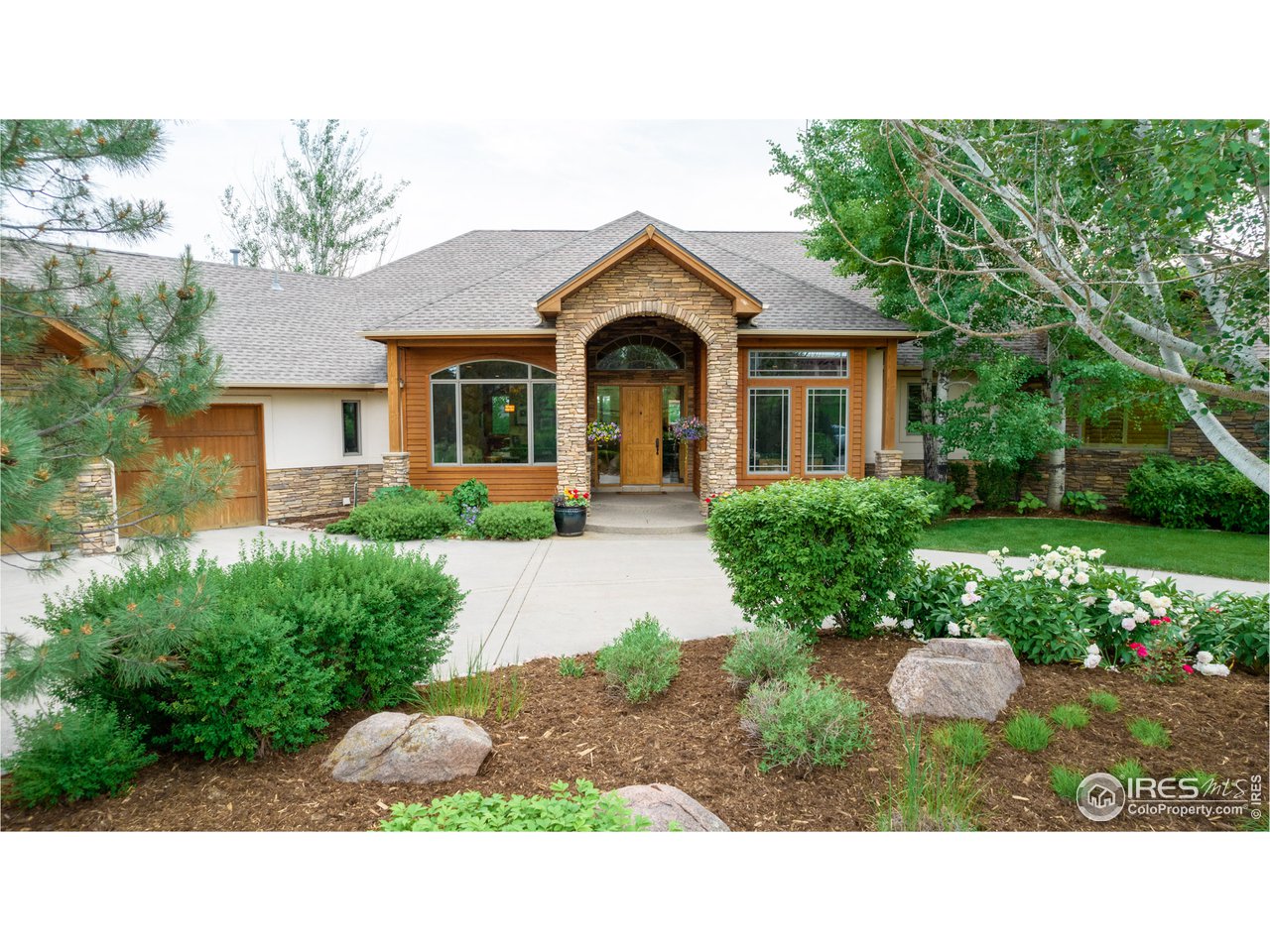 a view of a house with a garden