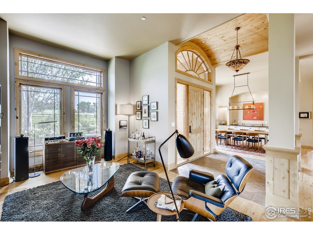 10484 Sunlight Drive Lafayette, CO 80026 - Photo 15 of 40 a living room with furniture and a large window