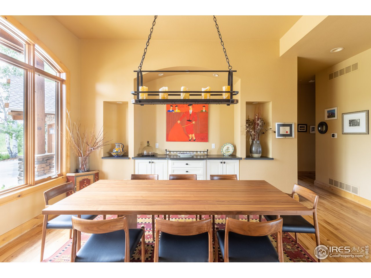 10484 Sunlight Drive Lafayette, CO 80026 - Photo 16 of 40 a dining room with a table and chairs