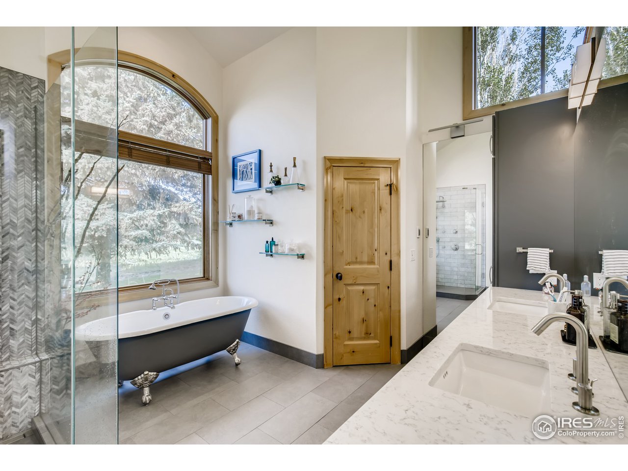 10484 Sunlight Drive Lafayette, CO 80026 - Photo 22 of 40 a living room with furniture and a large window