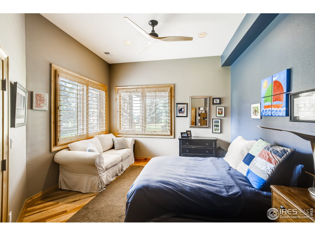 10484 Sunlight Drive Lafayette, CO 80026 - Photo 30 of 40 a bedroom with a bed and window
