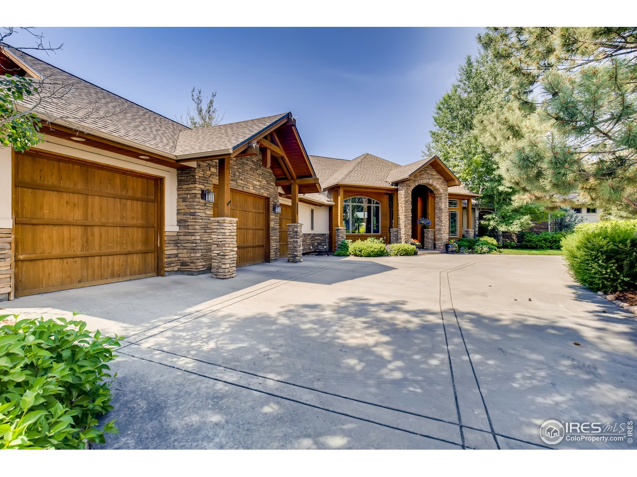 10484 Sunlight Drive Lafayette, CO 80026 - Photo 3 of 40 a front view of a house with a yard
