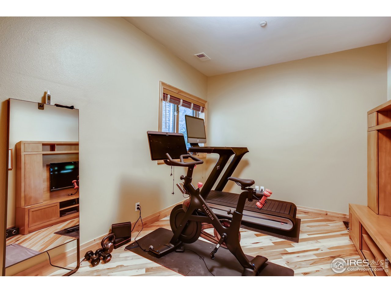 10484 Sunlight Drive Lafayette, CO 80026 - Photo 35 of 40 a room with furniture and gym equipment