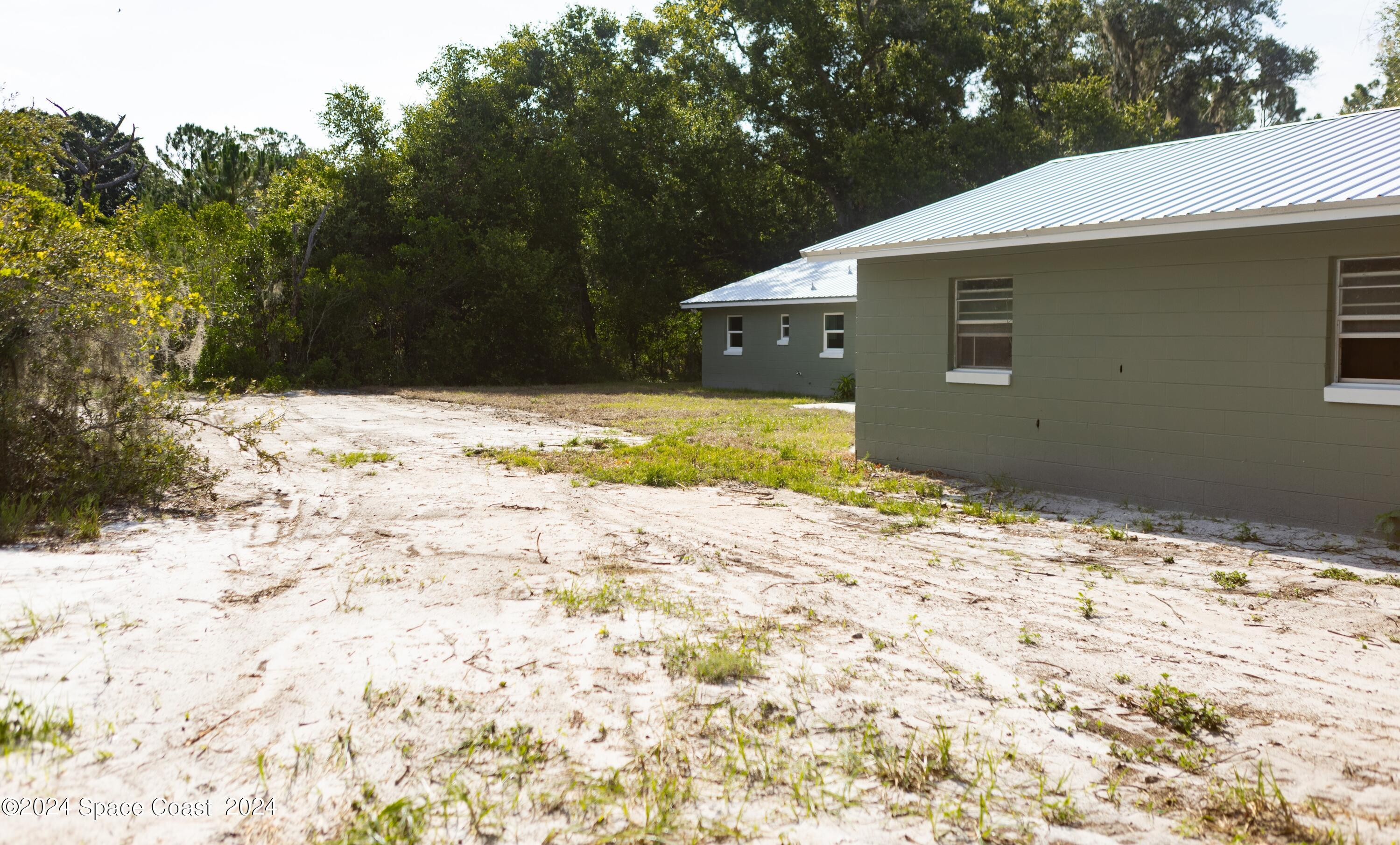 4706 Gandy Road Mims, FL 32754 - Photo 2 of 22 I03A3574