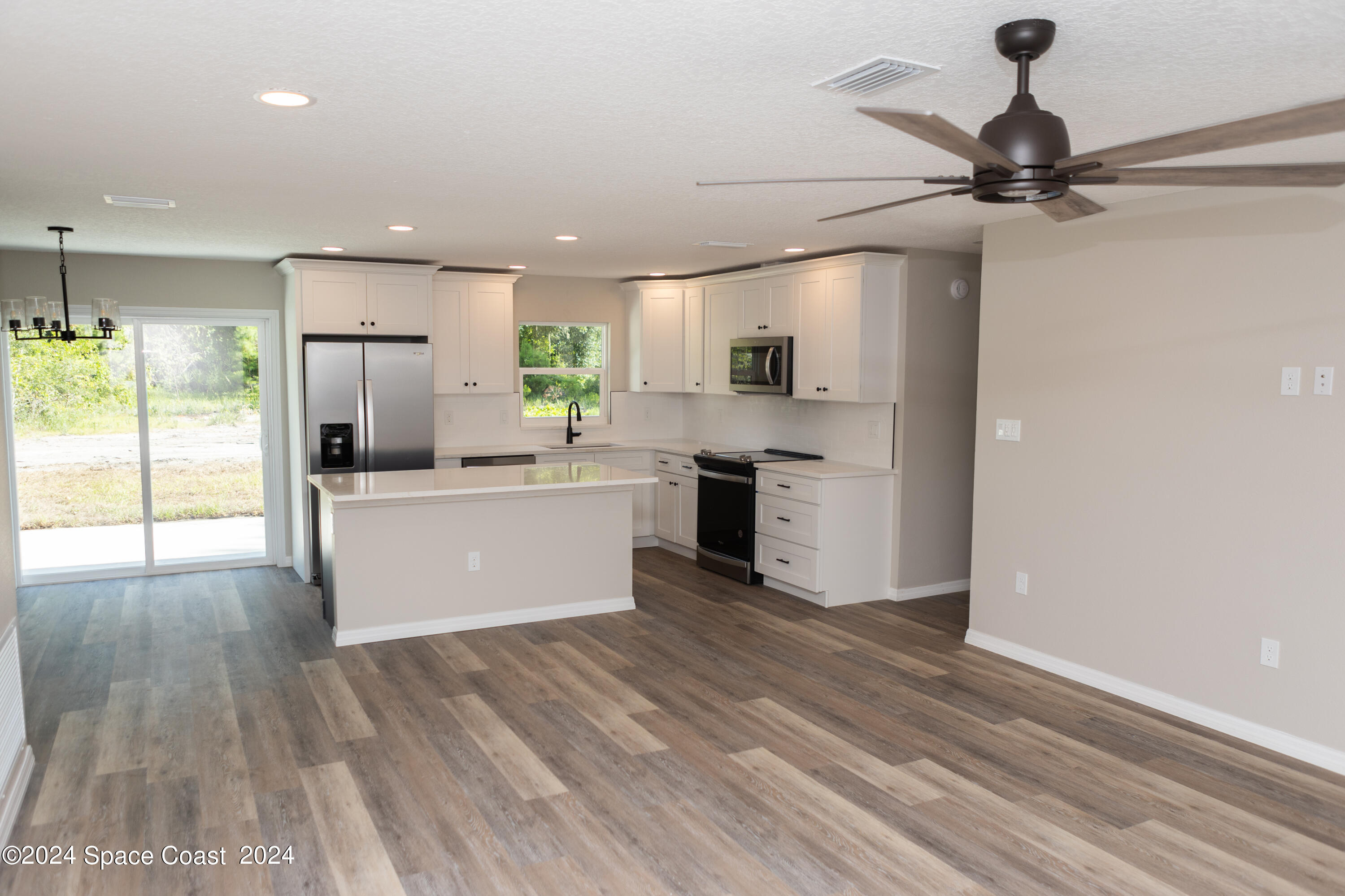 4706 Gandy Road Mims, FL 32754 - Photo 8 of 22 I03A3486