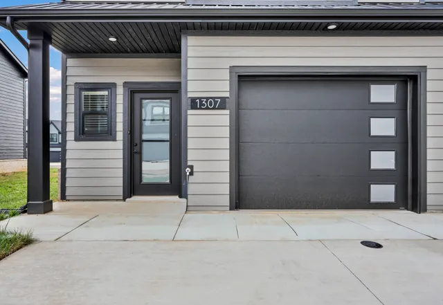 a view of entryway with brick walls