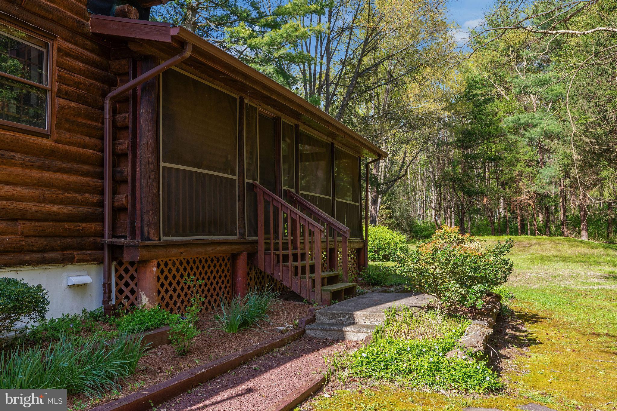 Steps from screened-in porch
