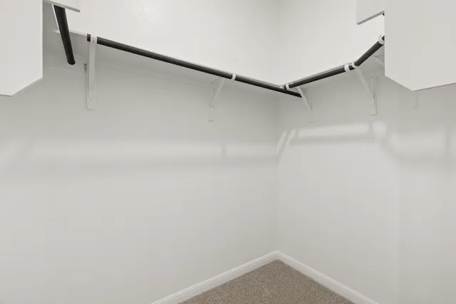 a bathroom with a sink double vanity and a mirror