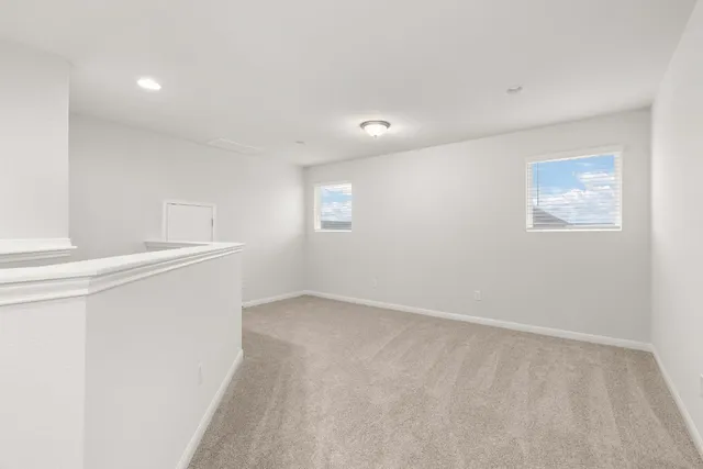 a bathroom with a shower a toilet and a sink