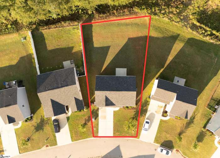 156 Queens Mill Court Pendleton, SC 29670 - Photo 2 of 18 An aerial view showcases a residential property with ample yard space and mature trees.
