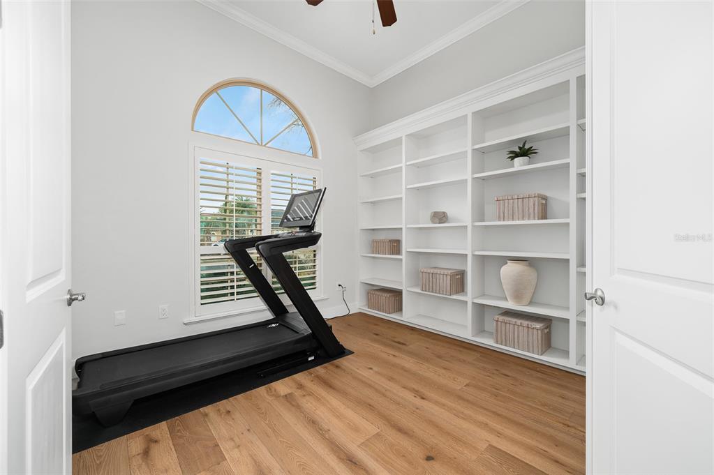 13549 Northwest 9 Road Newberry, FL 32669 - Photo 16 of 42 a view of a room with wooden floor and window