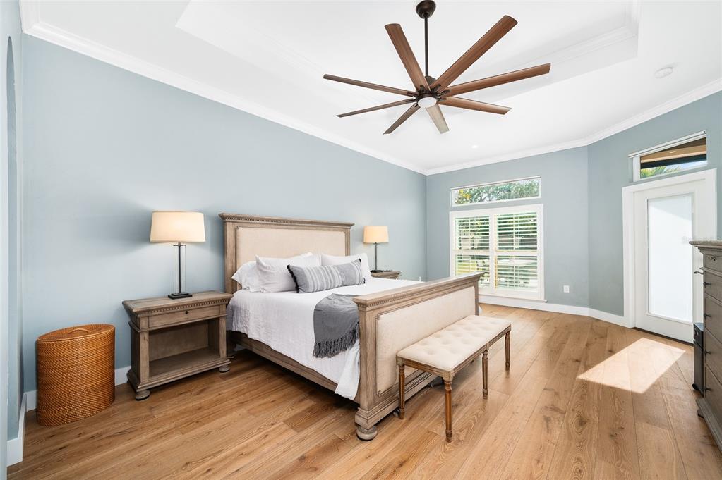 13549 Northwest 9 Road Newberry, FL 32669 - Photo 17 of 42 a bedroom with a bed and a chair