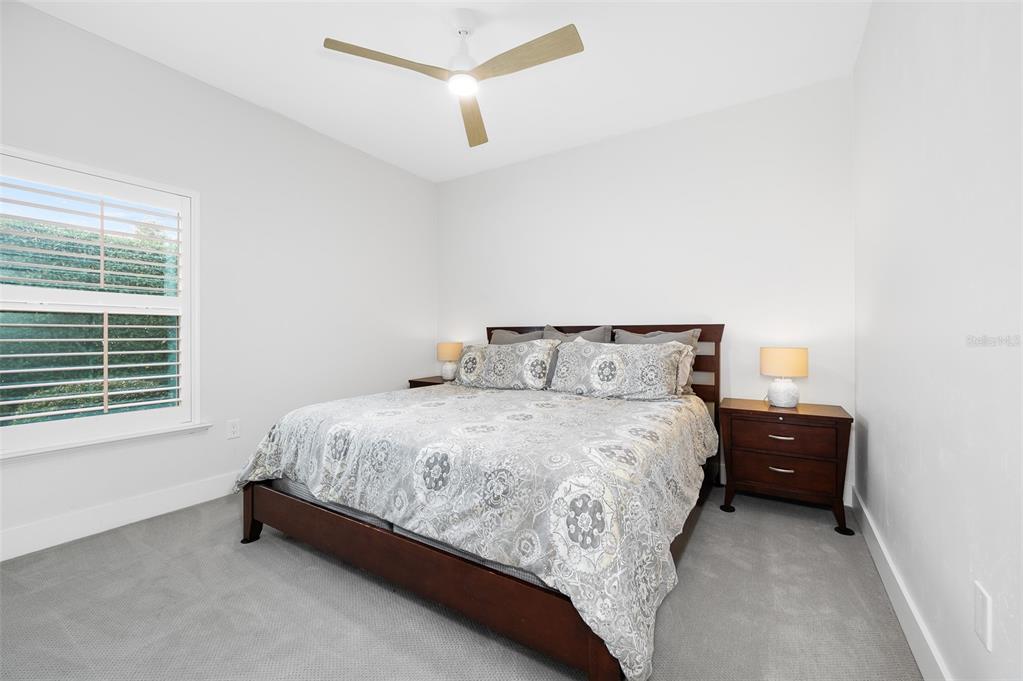 13549 Northwest 9 Road Newberry, FL 32669 - Photo 26 of 42 a bedroom with a bed and a window