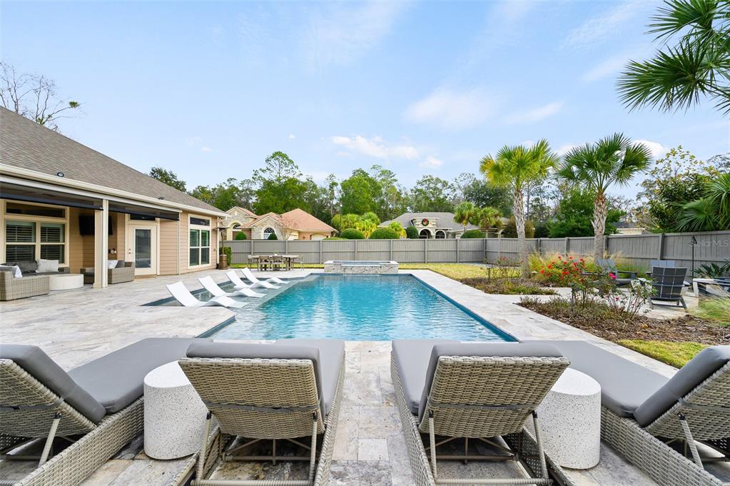 13549 Northwest 9 Road Newberry, FL 32669 - Photo 35 of 42 a view of a patio with swimming pool