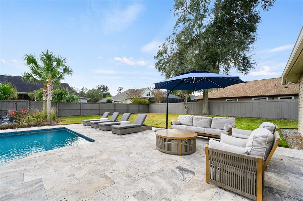13549 Northwest 9 Road Newberry, FL 32669 - Photo 37 of 42 a view of swimming pool with outdoor seating space