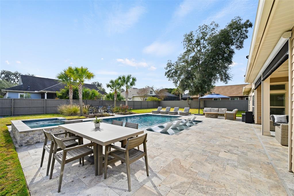 13549 Northwest 9 Road Newberry, FL 32669 - Photo 38 of 42 a view of swimming pool with outdoor seating and plants