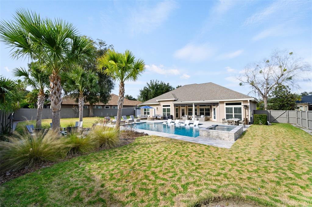 13549 Northwest 9 Road Newberry, FL 32669 - Photo 39 of 42 a view of a house with swimming pool and sitting area