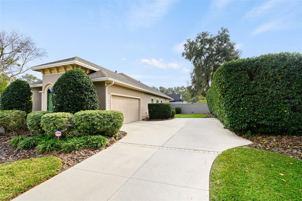 13549 Northwest 9 Road Newberry, FL 32669 - Photo 41 of 42 a front view of house with garden