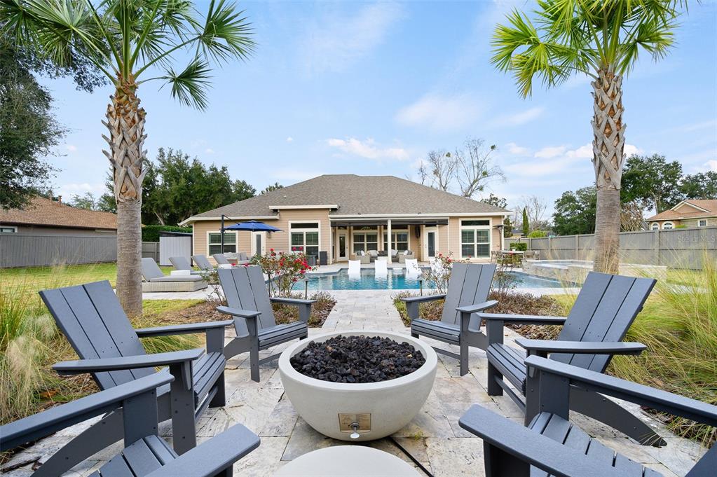 13549 Northwest 9 Road Newberry, FL 32669 - Photo 10 of 42 a view of a patio with couches chairs and a potted plant