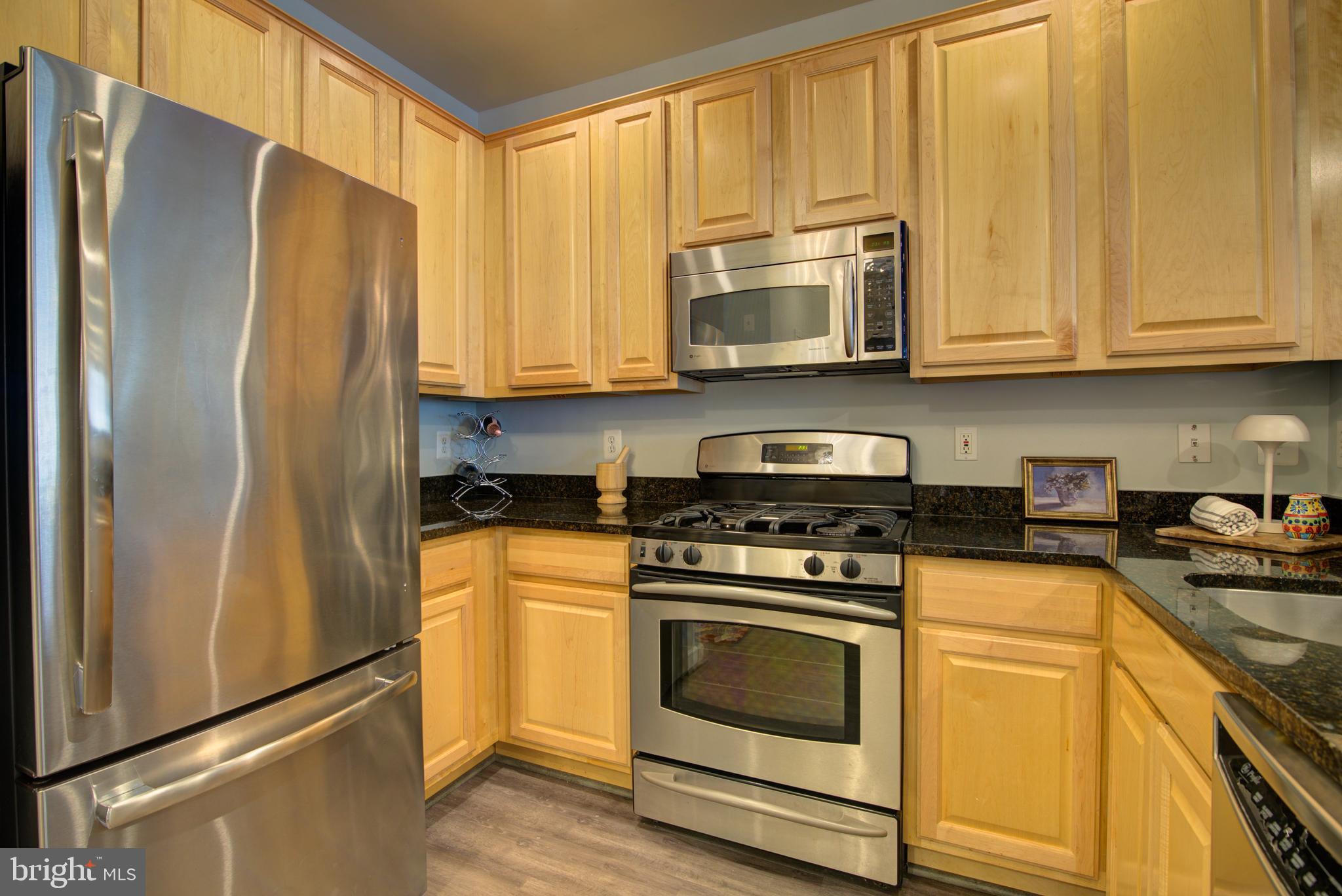 12000 Market Street, Unit 140 Reston, VA 20190 - Photo 14 of 30 Kitchen with LVP flooring