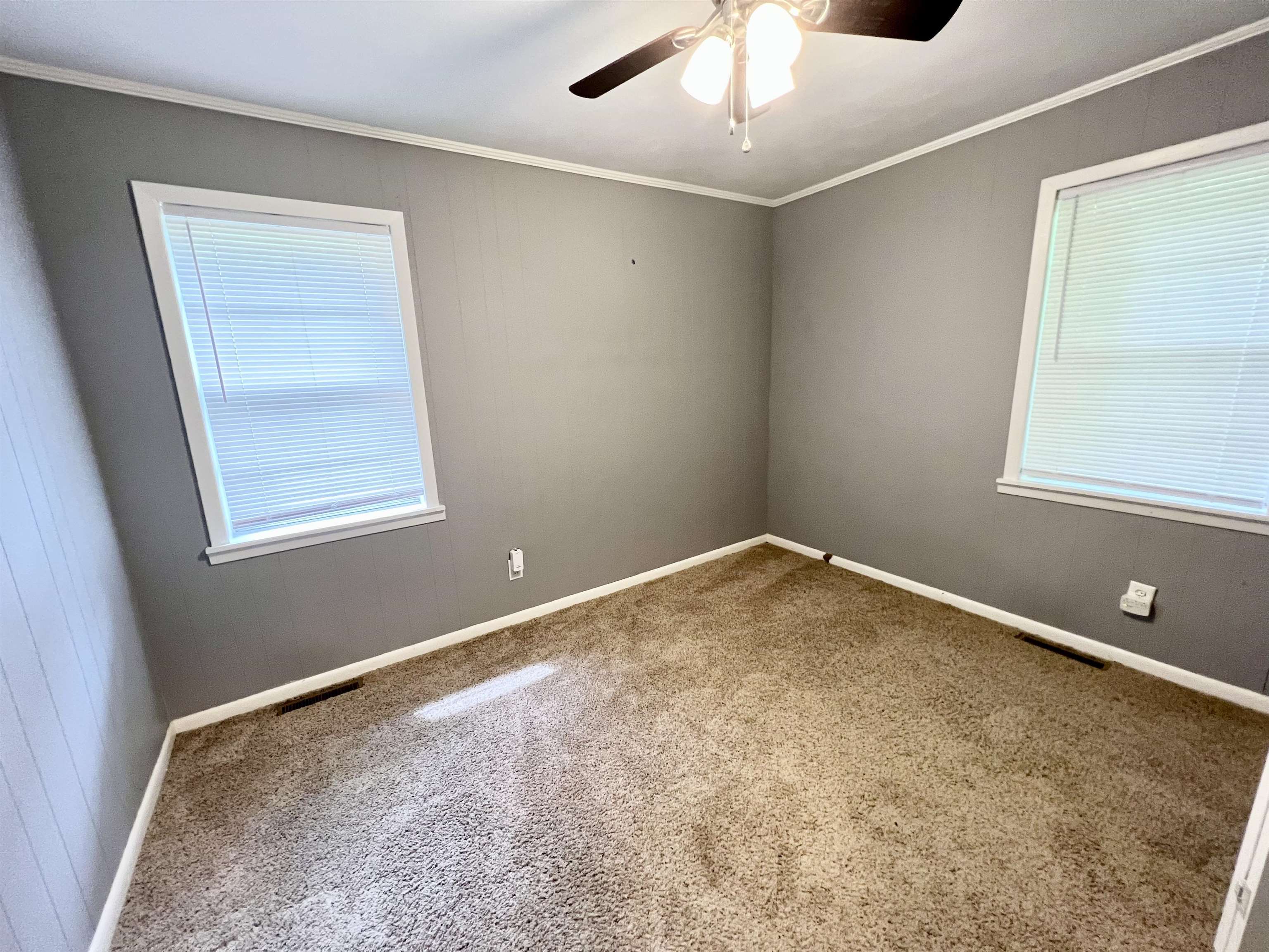 161 Miller Street Ripley, TN 38063 - Photo 5 of 10 en empty room with windows