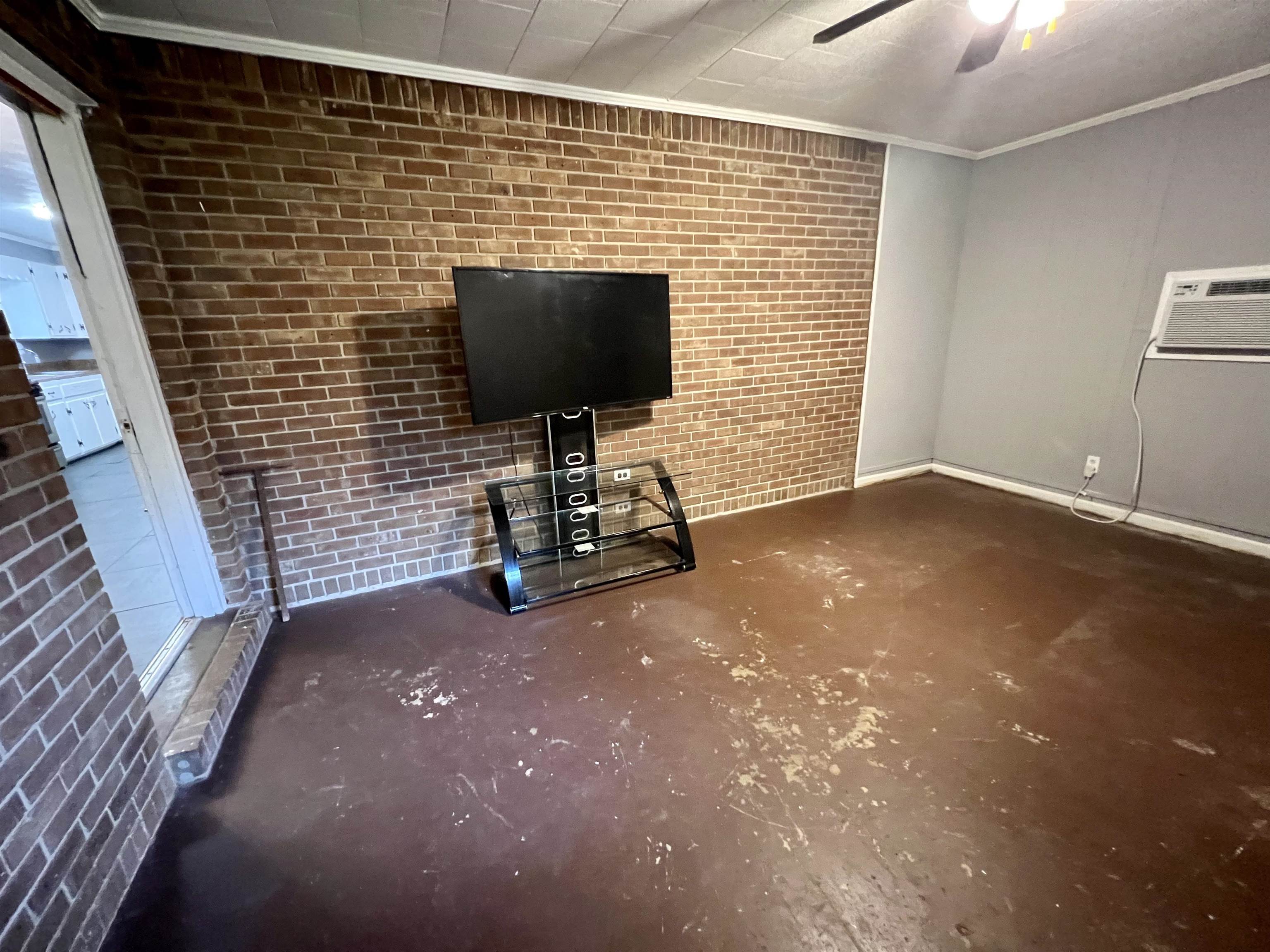 161 Miller Street Ripley, TN 38063 - Photo 10 of 10 a view of a livingroom with a flat screen tv