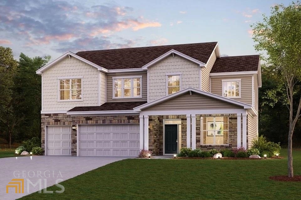 front view of a house with a yard