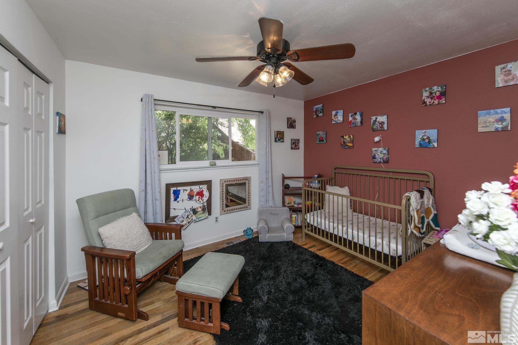 3475 Bryan Street Reno, NV 89503 - Photo 11 of 20 a bedroom with furniture and a fireplace