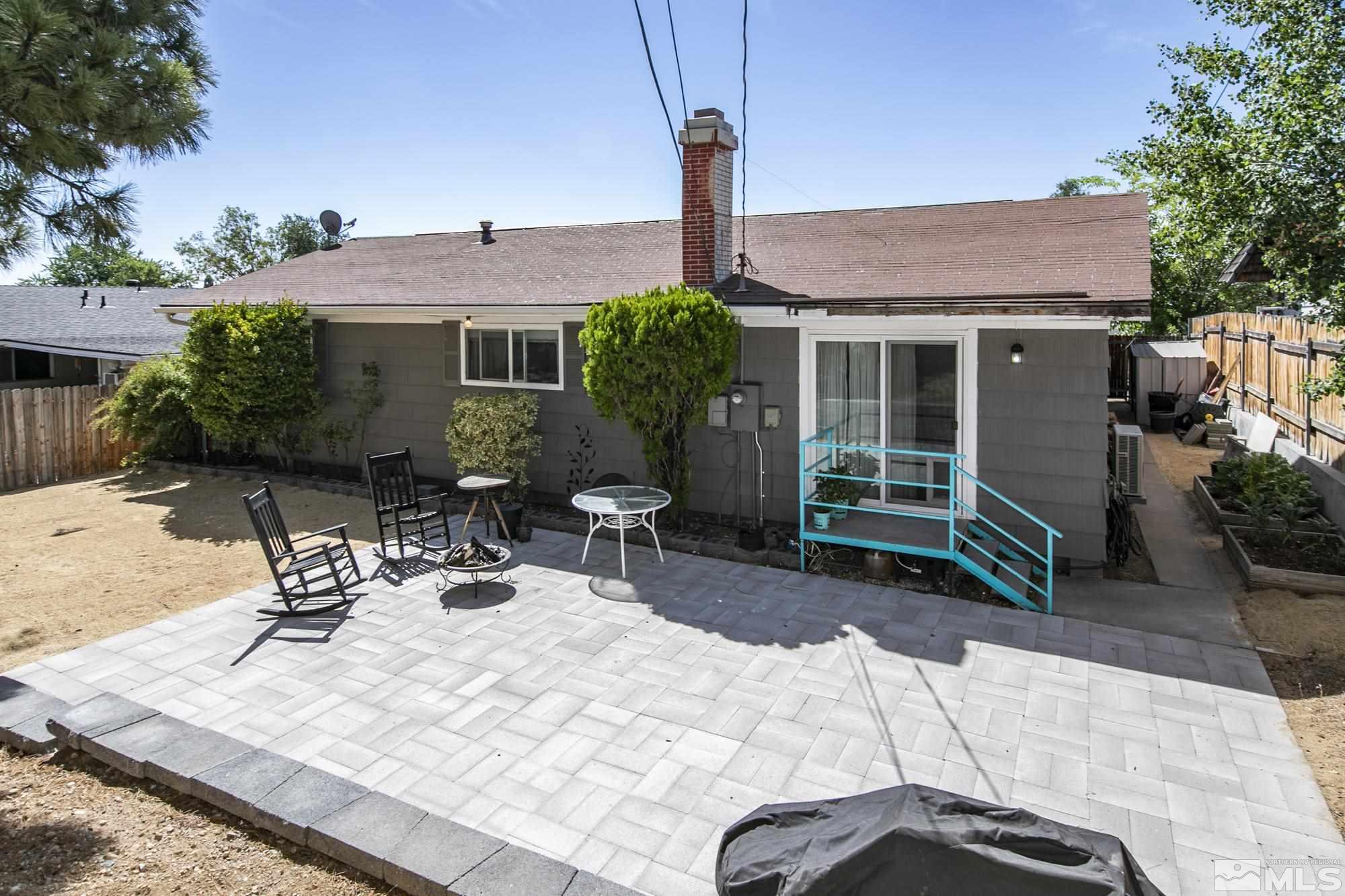 3475 Bryan Street Reno, NV 89503 - Photo 16 of 20 a view of a patio with a table and chairs