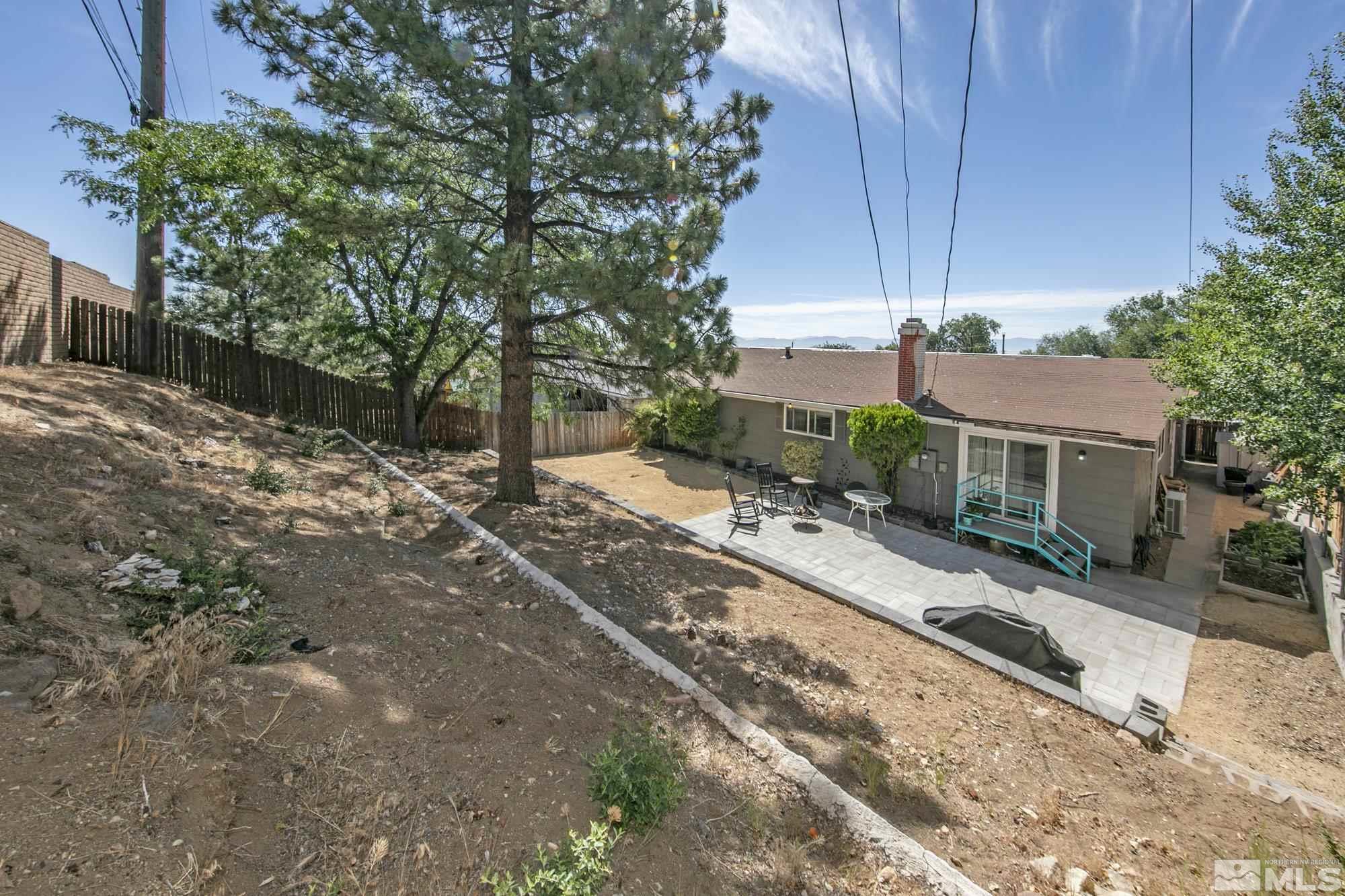 3475 Bryan Street Reno, NV 89503 - Photo 20 of 20 a view of a house with backyard and trees