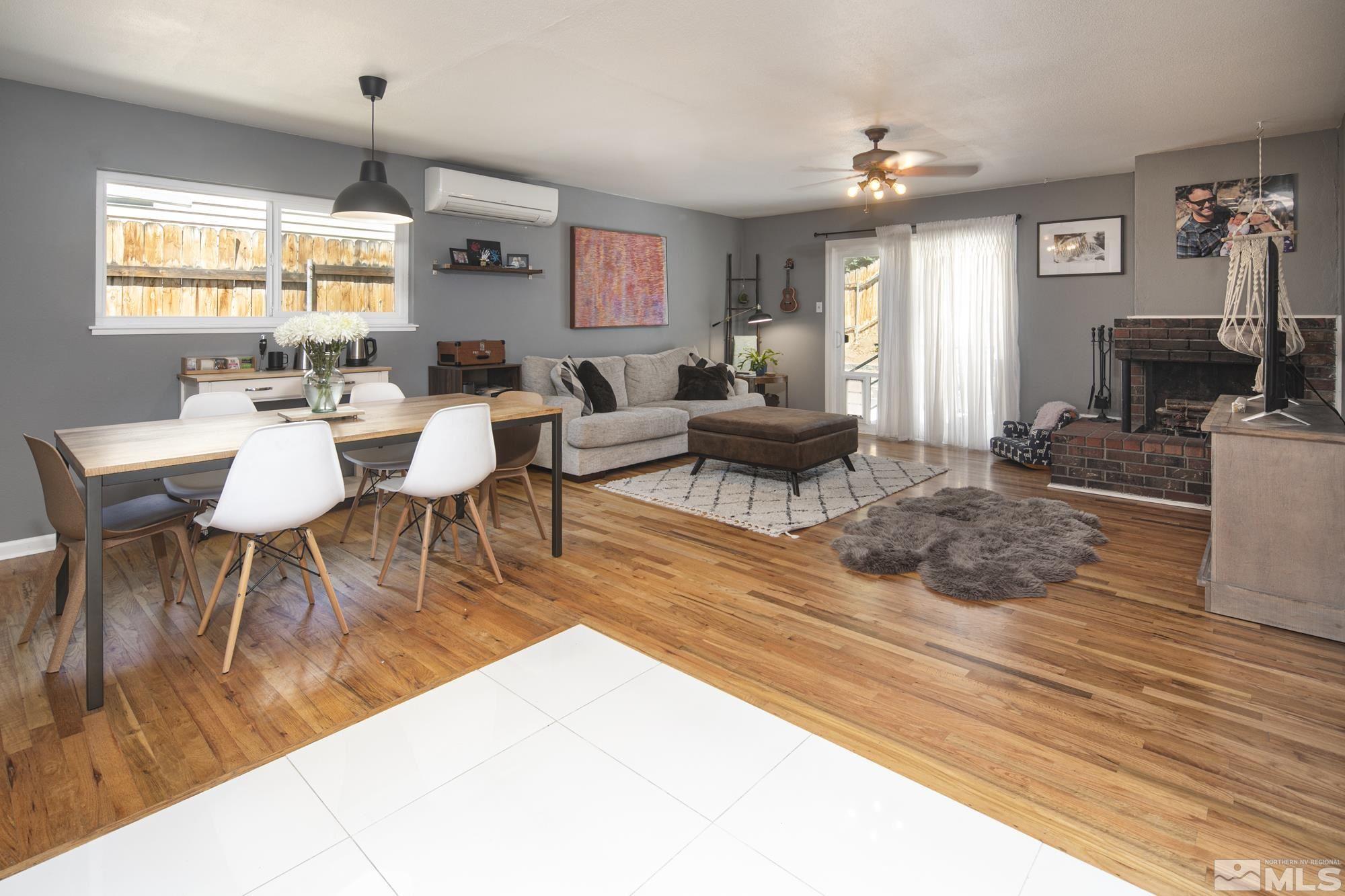 3475 Bryan Street Reno, NV 89503 - Photo 5 of 20 a view of a dining room with furniture window and wooden floor