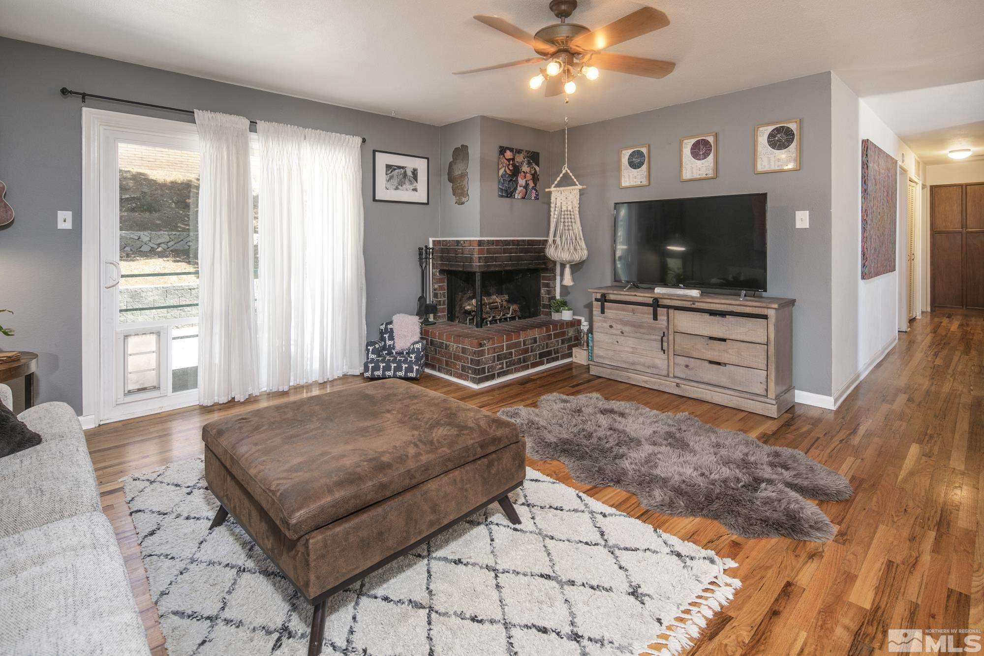 3475 Bryan Street Reno, NV 89503 - Photo 7 of 20 a living room with furniture and a flat screen tv