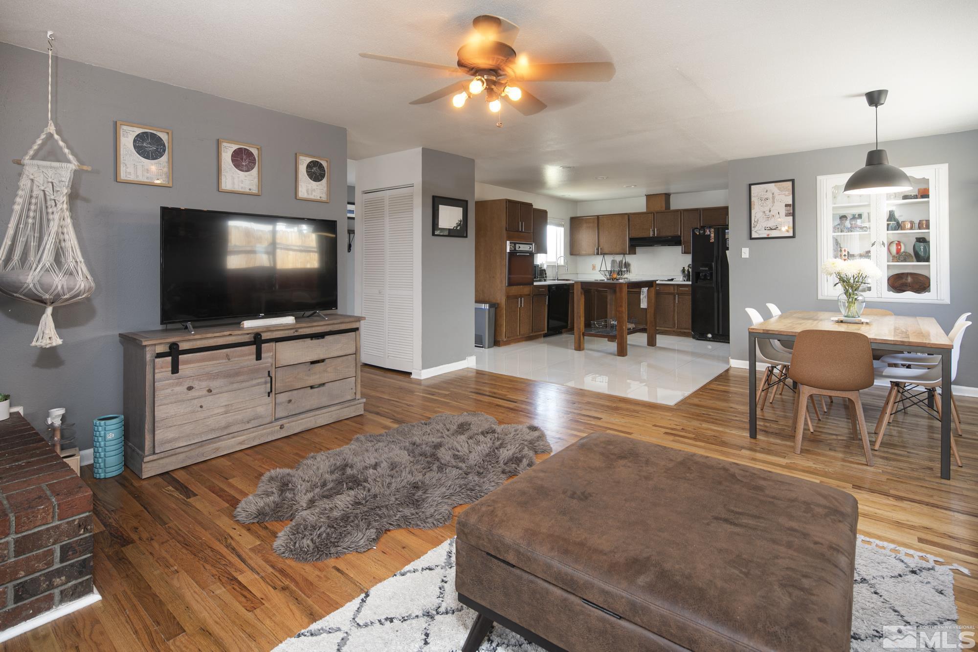 3475 Bryan Street Reno, NV 89503 - Photo 8 of 20 a living room with furniture and a flat screen tv