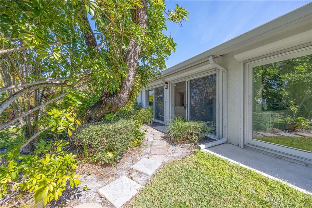 4732 West Boulevard, Unit E5 Naples, FL 34103 - Photo 35 of 40 View of yard