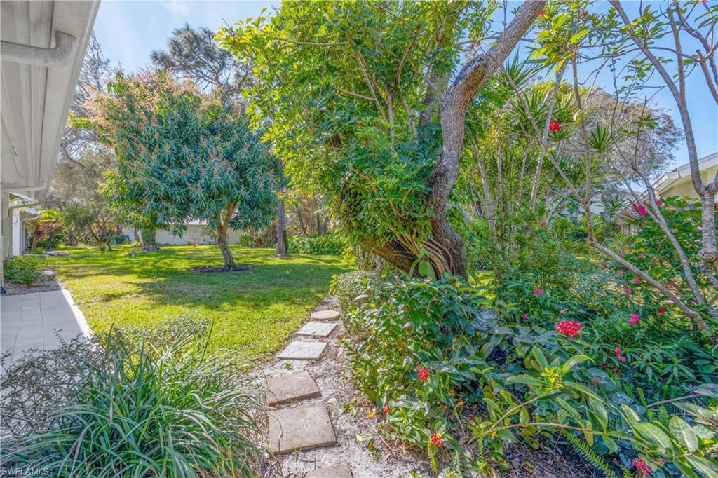 4732 West Boulevard, Unit E5 Naples, FL 34103 - Photo 36 of 40 View of yard