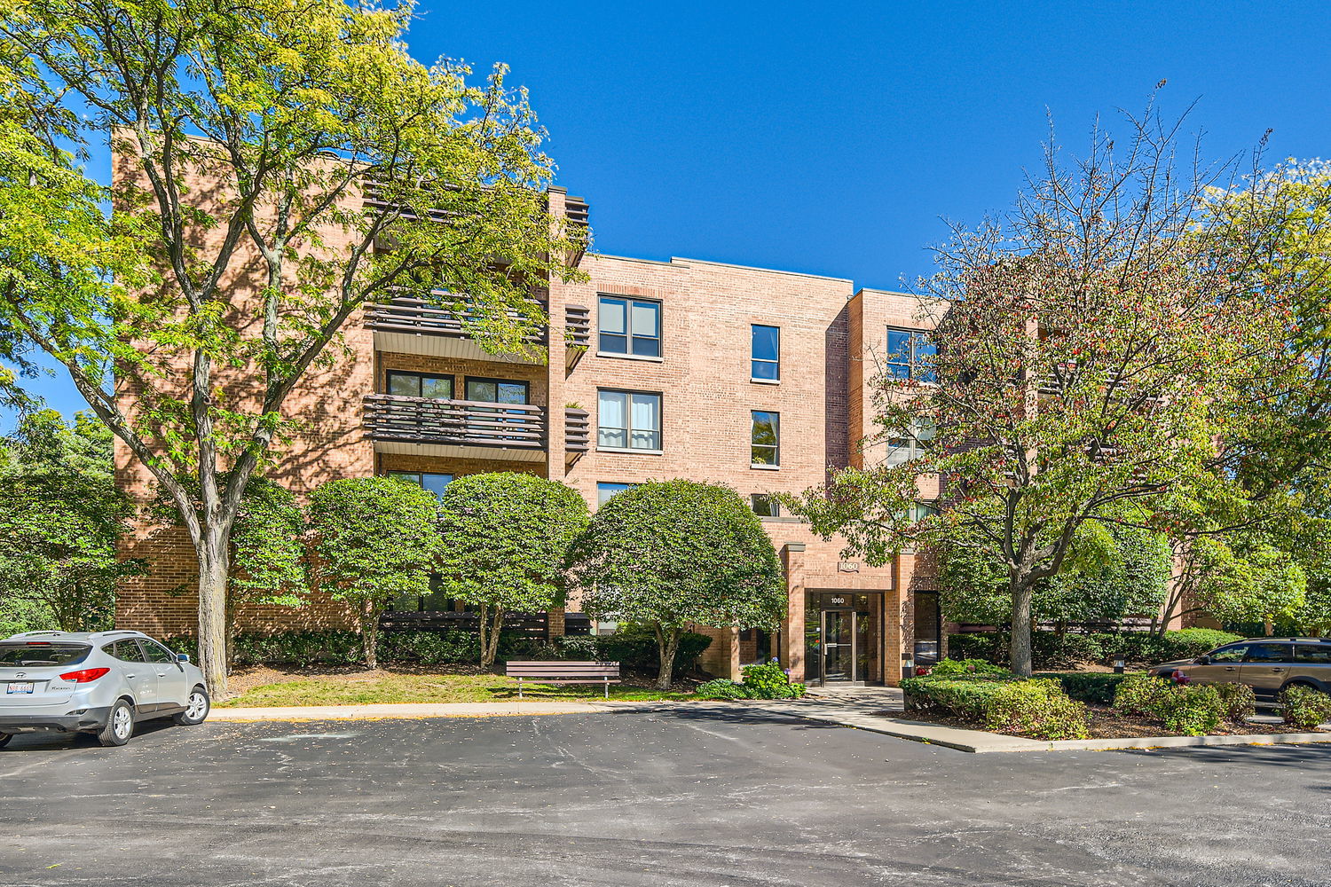 1060 Shermer Road, Unit 26 Northbrook, IL 60062 - Photo 1 of 17 a front view of a building