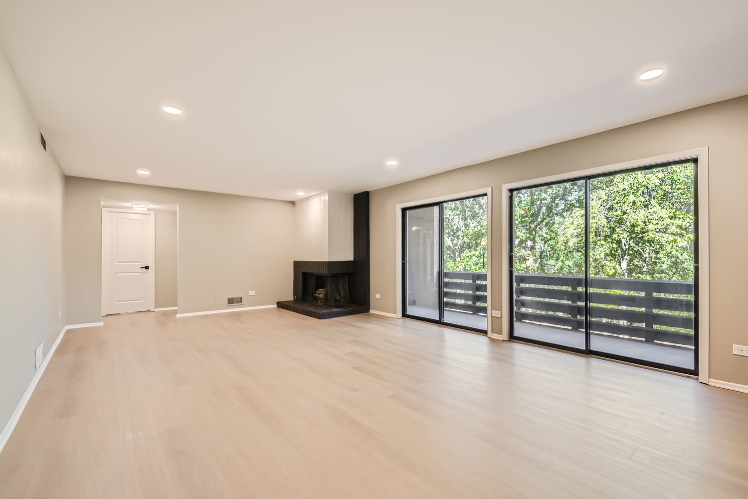 1060 Shermer Road, Unit 26 Northbrook, IL 60062 - Photo 8 of 17 an empty room with furniture and a floor to ceiling window