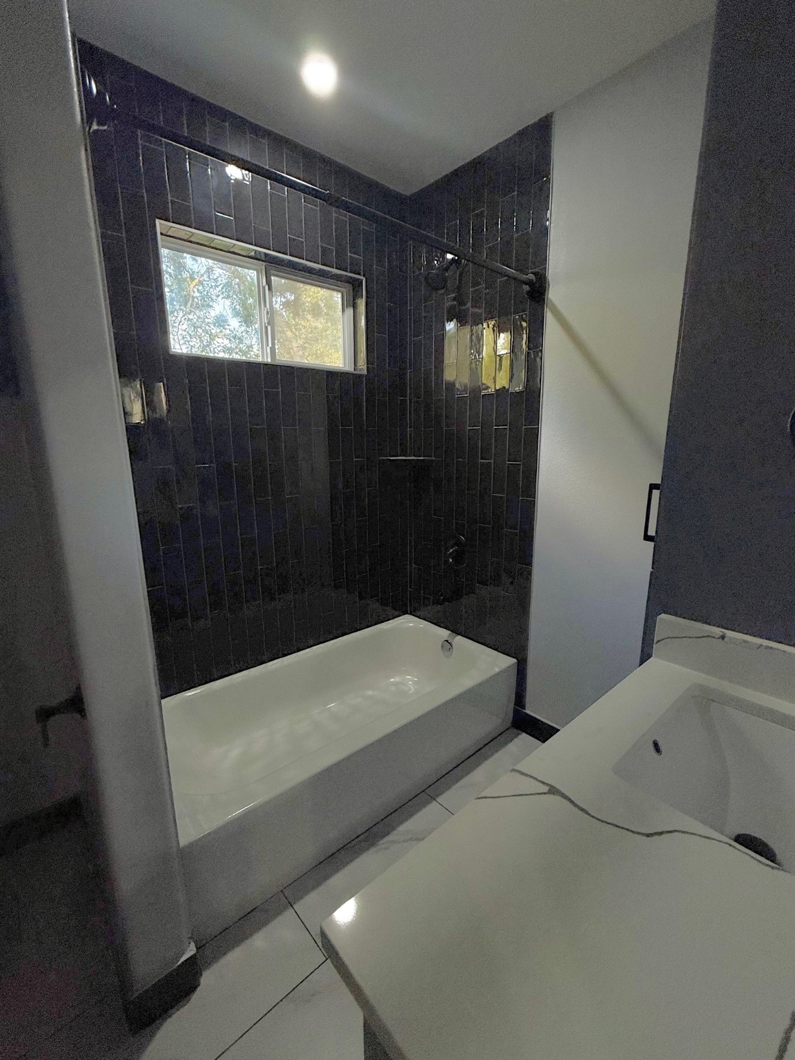 14213 4th Street Santa Fe, TX 77517 - Photo 9 of 20 a bathroom with a bathtub and shower