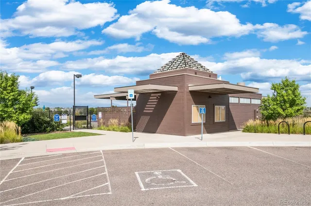 a view of a building with a street