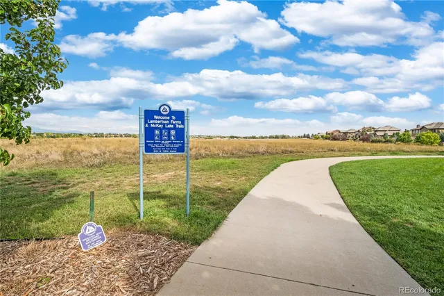 a view of a lake with a big yard