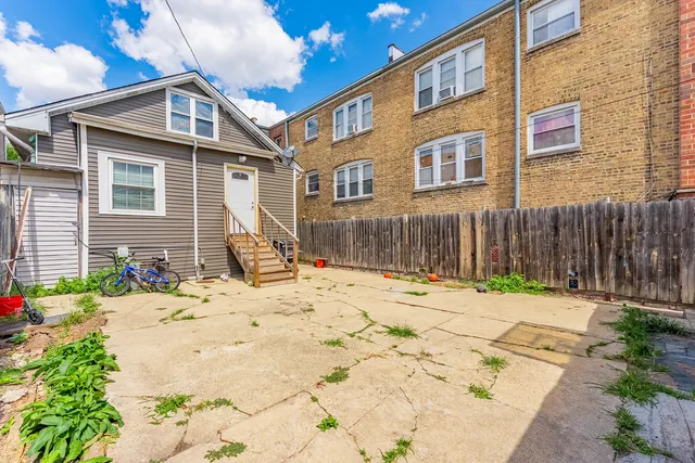 a front view of a house with a patio