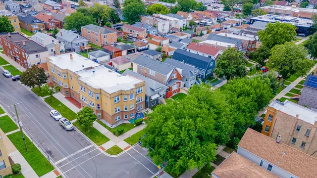 an aerial view of a house with a garden