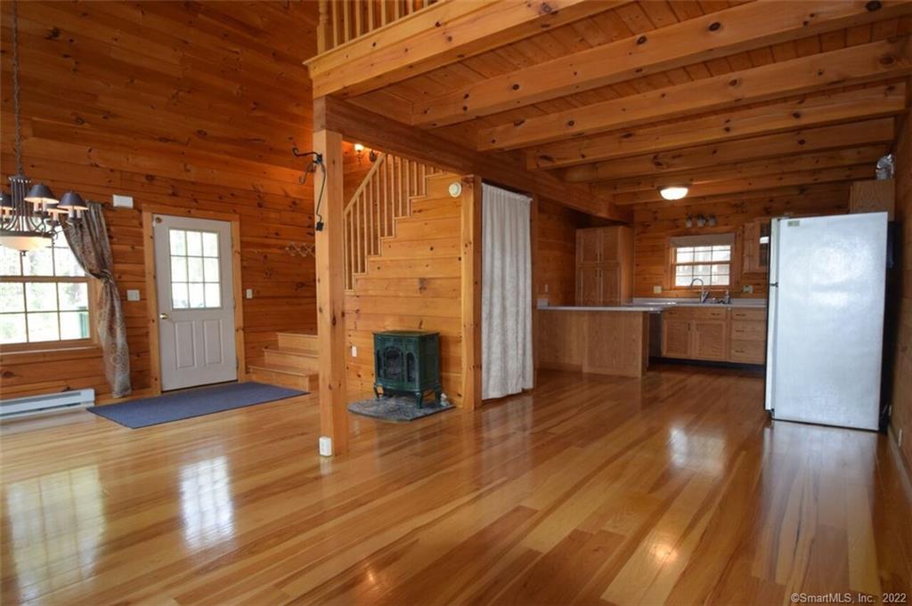 28 Hall Road Union, CT 06242 - Photo 1 of 1 Living room into kitchen